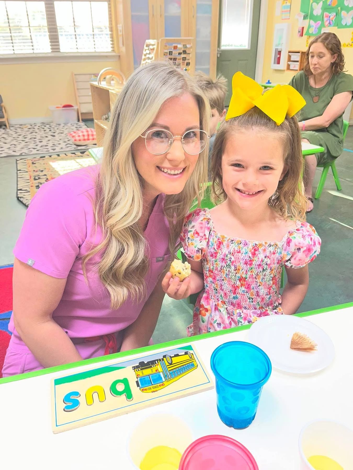 A parent and child attending an Amaze Academy event